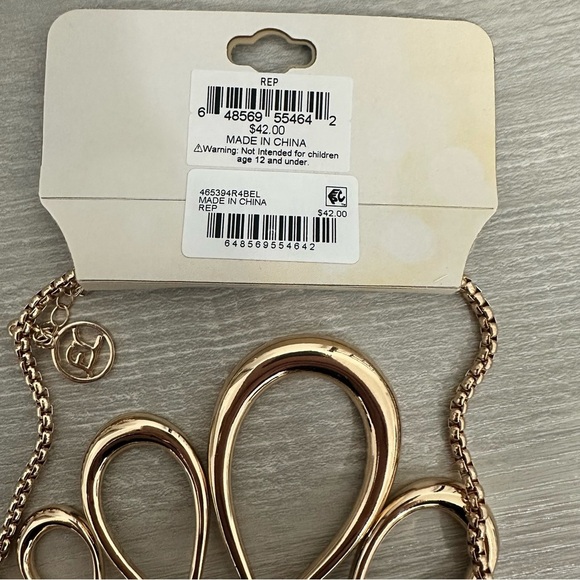 Erica Lyons shiny, gold toned, Infinity design bib necklace, statement piece. - Picture 7 of 10